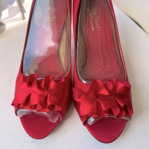 Red heel in a size 10